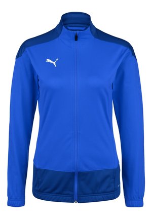 Veste à zip Puma d'un bleu vif, avec un col haut, des manches longues et un panneau bleu plus foncé en bas. Logo blanc sur la poitrine.
