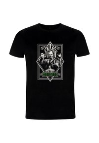 Czarny bawełniany t-shirt z centralną grafiką postaci z "Beetlejuice" w odcieniach szarości z zielonym tekstem. Okrągły dekolt, krótkie rękawy.