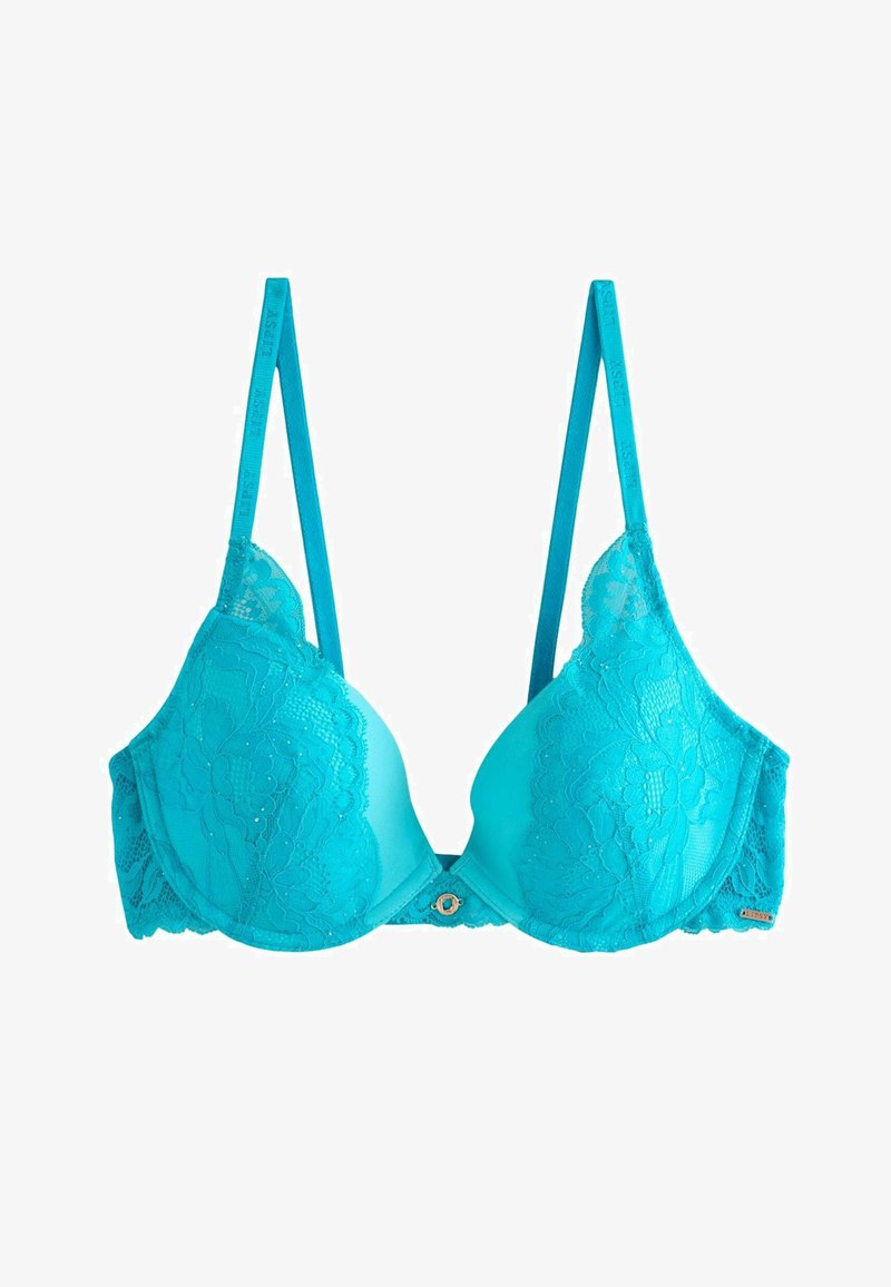 Soutien-gorge en dentelle turquoise vif avec bretelles réglables, bonnets à armatures et petit charme décoratif au centre avant.