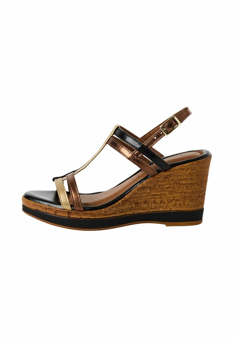 Wedge sandal with a cork heel, black and metallic bronze straps, and a gold accent. Open toe design and adjustable ankle strap.