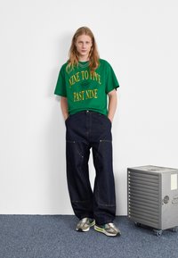 Carhartt WIP NASH PANT SMITH - Relaxed fit -farkut - blue rinsed