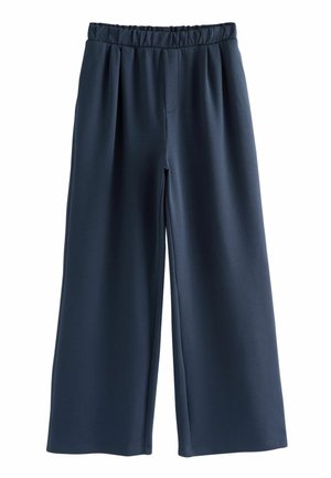 Kalhoty s širokými nohavicemi z tmavě námořnické látky s elastickým pasem, které mají jemnou texturu a skryté boční kapsy.