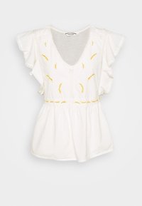 Vit blus med kort ärm som har gul blommig broderi, en djup V-ringning och en veckad midja för en avslappnad passform. Texturerat, lättviktigt tyg.