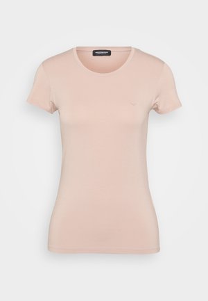 Light pink short-sleeve t-shirt made of soft cotton, featuring a round neckline and a small logo on the left chest. Smooth texture throughout.