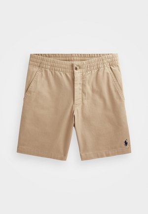 Shorts en coton beige avec taille élastiquée, fermeture par bouton, poches latérales et petit logo brodé foncé sur l'ourlet de la jambe gauche.
