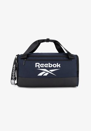 Borsa da viaggio Reebok blu navy e nera con scomparti con cerniera, manici neri e tracolla regolabile con marchio Reebok.