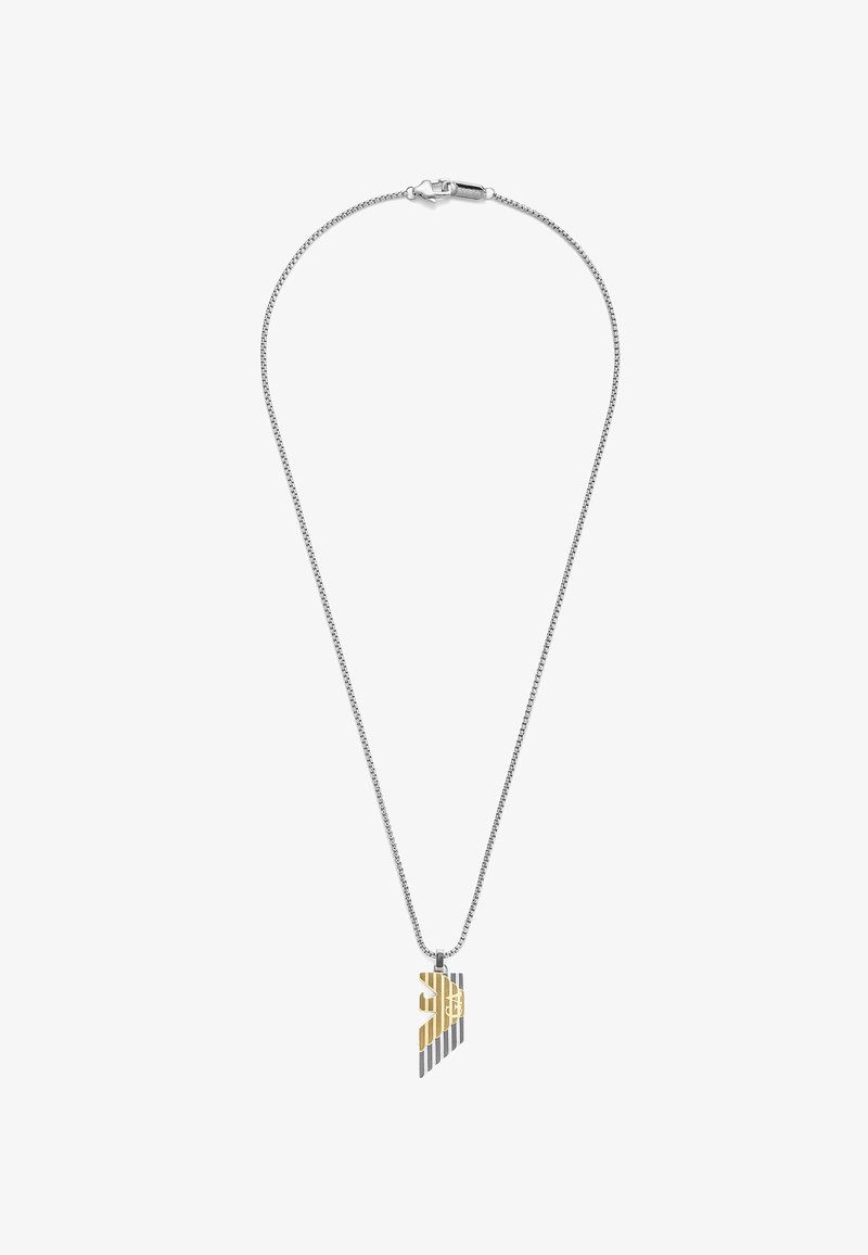 Hopeaketju, jossa on geometrinen riipus kullassa ja hopeassa, jossa on raidoitettu kuviointi ja keskeinen pyöreä yksityiskohta.