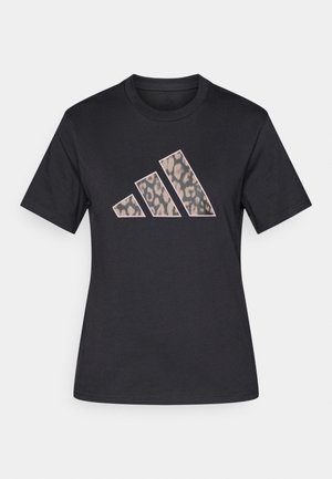 Svart t-skjorte i bomull med et stort, leopardmønstret Adidas-logo i dempede farger, korte ermer og rund hals.