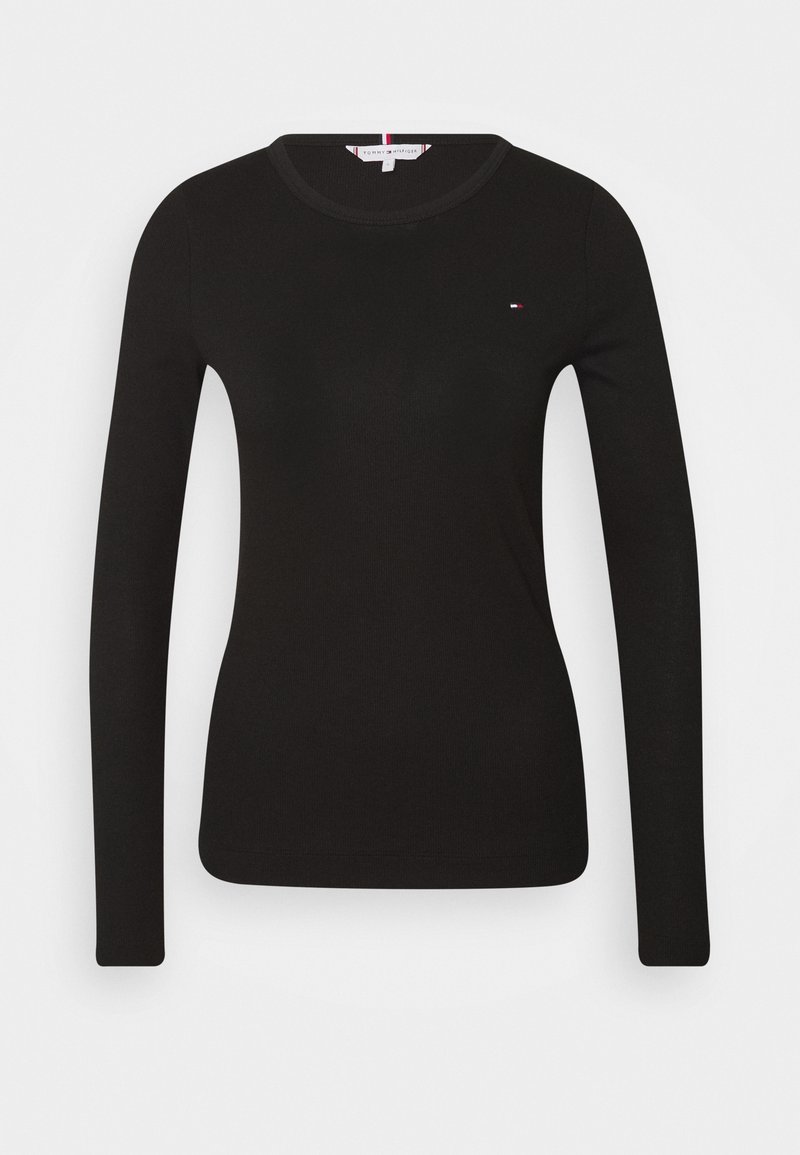 Top negro de punto ajustado con mangas largas, cuello redondo y pequeño logo de Tommy Hilfiger en el pecho izquierdo.