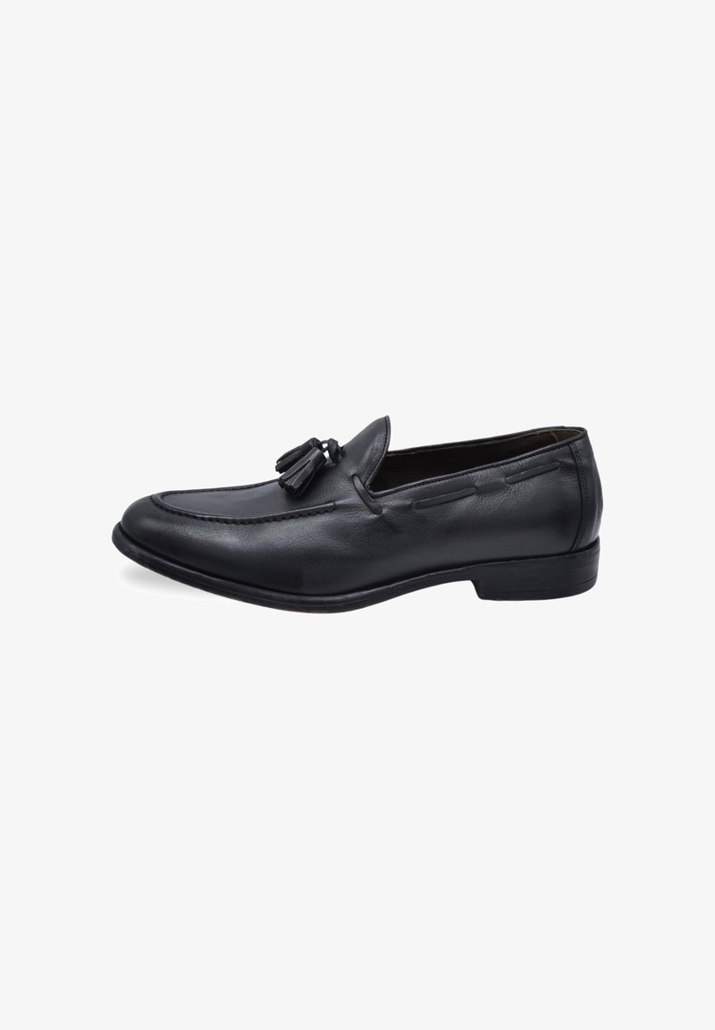 Black leather loafers with tassel detail, featuring a stitched design and flat sole. Smooth texture with a classic shape.