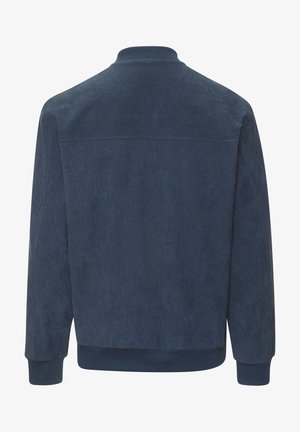 Marineblaue Cordjacke aus Cord mit langen Ärmeln, gerippten Bündchen, Kragen und Saum, von hinten auf weißem Hintergrund gezeigt.