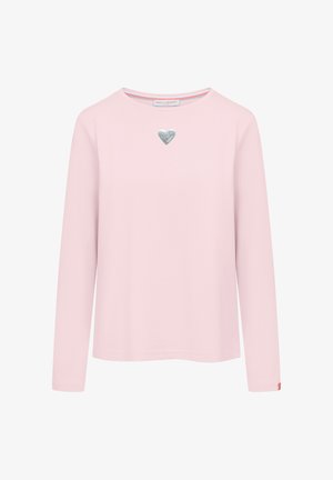 Lange mouw roze shirt gemaakt van zachte katoen, met een zilveren hartaccent op de borst en een ronde halslijn met contrasterende bies.