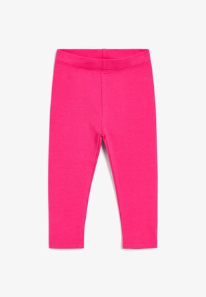Leggings fucsias hechos de una tela suave y elástica. Presentan una cinturilla suave y un diseño ajustado, llegando hasta el tobillo sin patrones.