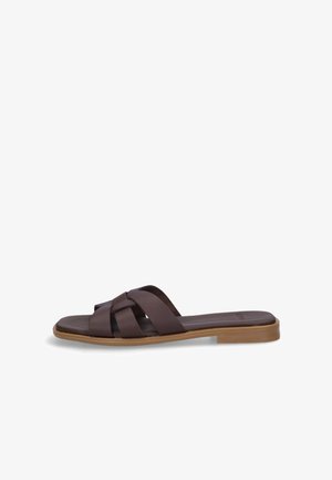 Brown leather slide sandal with crisscross straps and flat tan sole, designed for casual wear.