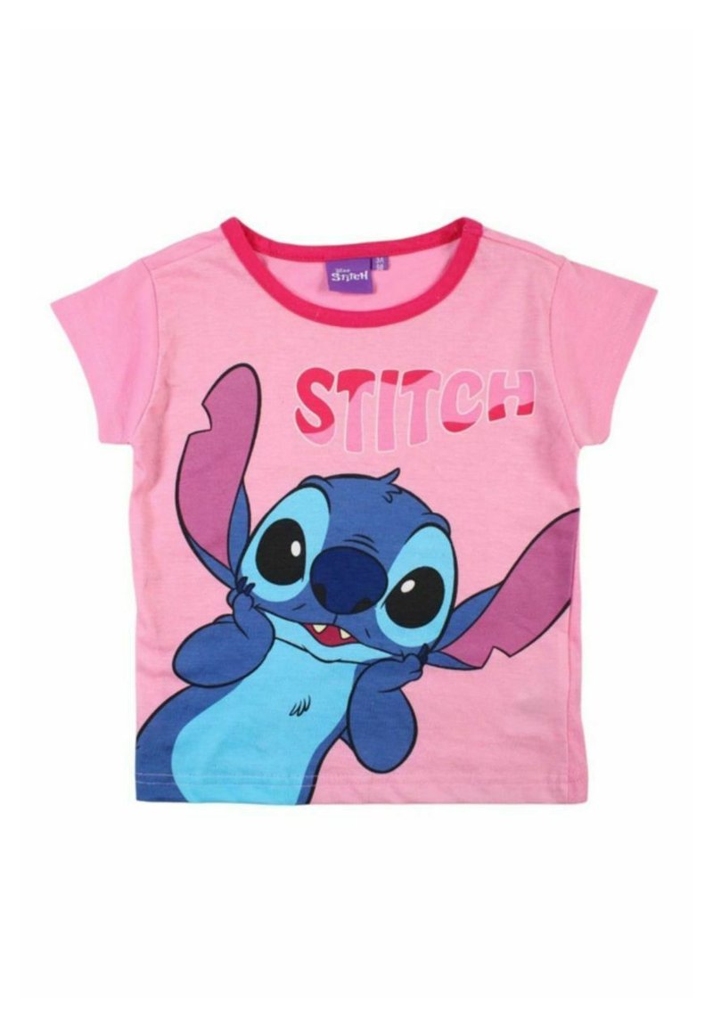 T-shirt rose pour enfants à manches courtes, avec un grand graphique représentant un personnage de dessin animé bleu et le mot "STITCH" en lettres majuscules et dans une police ludique.