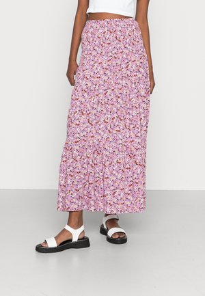 Maxinederdel i lys lilla med et blomsterprint med små blomster i flere farver. Elastisk talje, flæsekant, lavet af let stof.