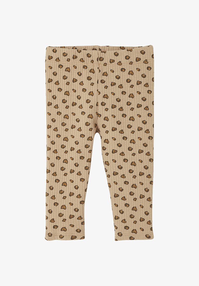Rippige beige Leggings mit einem Leopardenmuster in Brauntönen. Sie haben einen elastischen Bund und sind knöchellang.