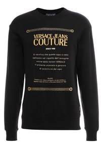 Sudadera negra con texto bordado en dorado, cuello redondo y puños de canalé. Fabricada con tejido de alta calidad y una textura suave.