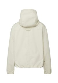 Svetlo béžová bunda s kapucňou, dlhými rukávmi, elastickými manžetami a mierne naberaným elastickým lemom, zobrazená zozadu.