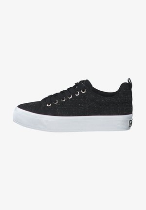 Black canvas sneakers with a textured finish, white rubber sole, silver eyelets, and black laces; features a pull tab on the heel.