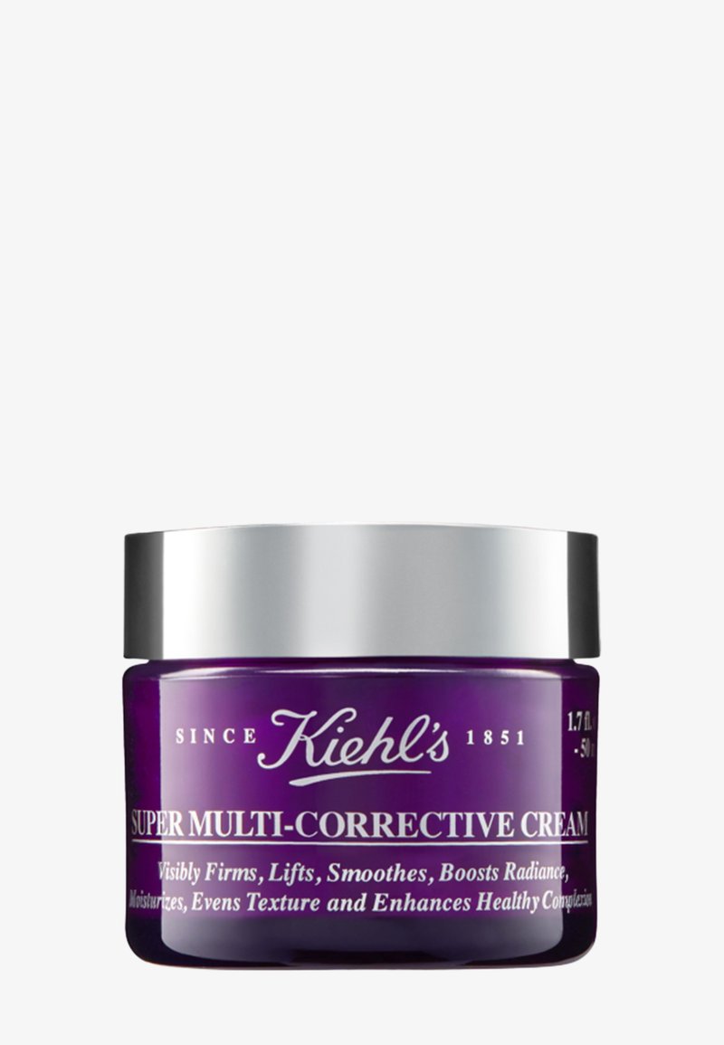 Lila Glasdose mit einem silbernen Deckel, beschriftet mit "Super Multi-Korrektur-Creme." Enthält 50 ml (1,7 fl oz) Creme. Glatte Textur.