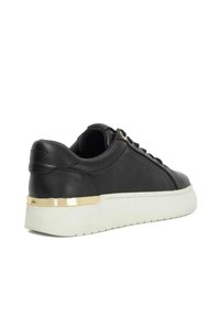 Black leather sneaker with a textured finish, white rubber sole, gold accent at the heel, and traditional lacing system.
