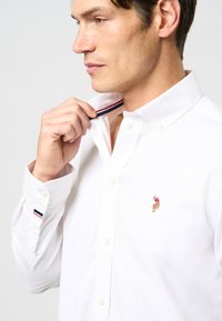 U.S. Polo Assn. CALVERT FLEX - Majica - white