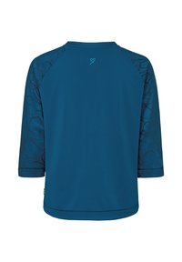 Chemise bleue à manches trois-quarts avec des motifs abstraits foncés sur les manches et un petit logo en forme de cœur sur le haut du dos.