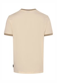 T-shirt in cotone beige con maniche corte. Collo e bordi delle maniche a costine in un beige più scuro. Design semplice e classico.