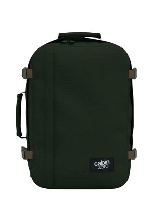 Zaino da viaggio rettangolare verde scuro con maniglia laterale, maniglia superiore, cinghie di compressione e logo "cabin zero" sul davanti.