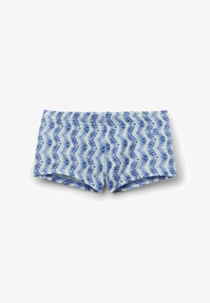 Blå og hvide badeshorts med zigzag-mønster og tætsiddende design, lagt fladt mod en hvid baggrund.