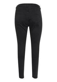 Jean skinny noir avec une texture lisse, présentant une taille mi-haute, deux poches à l'arrière et des détails de couture le long des coutures.