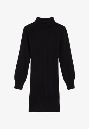 Sort rillekjole med høj turtleneck, lange puffærmer og et tætsiddende design, der har vertikal struktur hele vejen igennem.