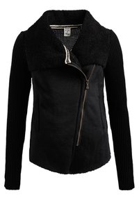 Veste noire avec col texturé épais, fermeture éclair avant asymétrique, manches longues tricotées et poches latérales.