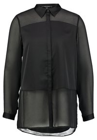 Blouse noire à manches longues avec un col pointu, un devant à boutons, un panneau supérieur opaque et un tissu transparent sur les manches et le bas du corps.