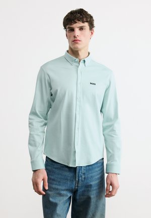 MOTION - Srajca - turquoise aqua