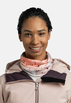 Multi-functional neck gaiter made of stretchy fabric, featuring a gradient of pink to white with abstract patterns. Worn under a light jacket.