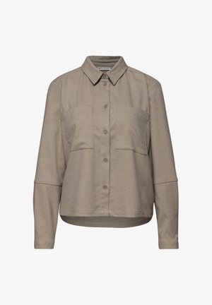 Khaki button-up shirt with long sleeves, two chest pockets, and a classic collar. Made of a textured fabric, featuring a relaxed fit.