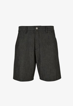 Fekete farmer sort klasszikus szabással, gombzárral, övhurkokkal és finom varrási részletekkel. Térd közép hossza.