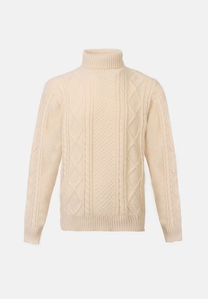 Krämfärgad polotröja med kabelstickade mönster, ribbade manschetter och en texturerad design över framsidan och ärmarna.
