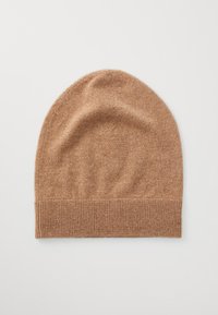Bonnet en tricot marron fabriqué en matériau doux, avec un revers côtelé et une texture lisse. Le design est une simple forme arrondie.