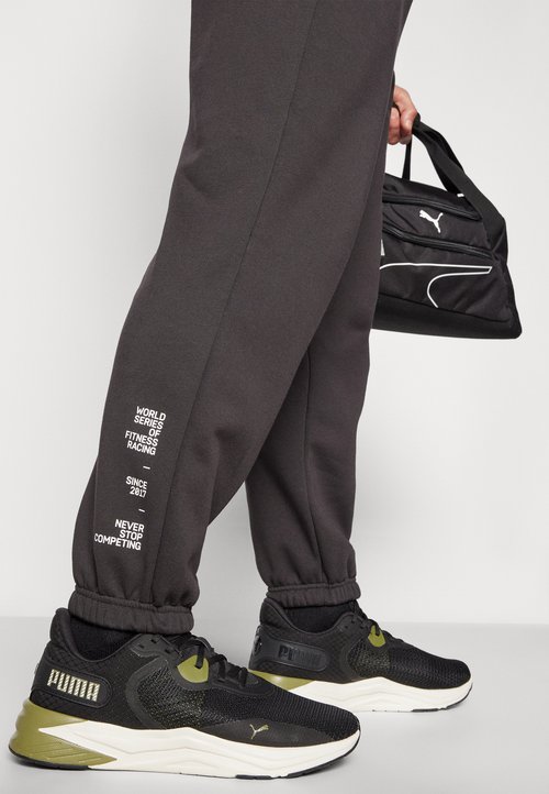 PUMA HYROX SWEATPANT - Tracksuit bottoms - black — photo 4