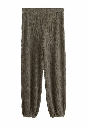 - Spodnie materiałowe