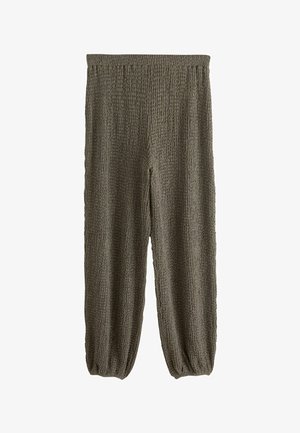 - Spodnie materiałowe