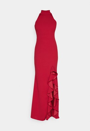 Rochie roșie cu guler halter, cu un corset ajustat și un detaliu de volan pe lateral. Fabricată dintr-un material neted, prezintă o siluetă de lungime până la podea.
