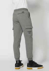 Koroshi LARGO - Donji dijelovi trenirke - gris medio vigoré   dark grey vigore