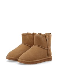 Tan suede ankle boots with a rounded toe, stitched detail, and a side button accent. Soft interior lining and flat rubber soles.
