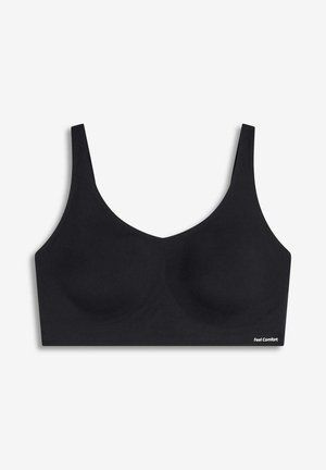 Soutien-gorge noir sans coutures avec bretelles larges, texture lisse et design épuré. Doté de coussinets amovibles et d'un détail de logo subtil.