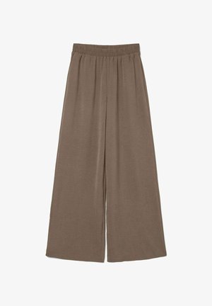 Pantalon ample couleur marron clair en tissu doux, avec une taille élastique et une coupe fluide, au design simple et sans ornements.