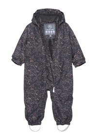 Svart vattentät overall med ett blommönster i rosa och vitt, med dragkedjestängning, elastiska ärmslut och fotremmar.